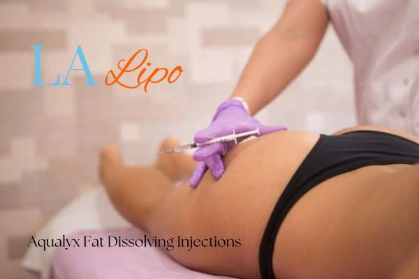 Woman having fat dissolving injections Lower Morden on thighs