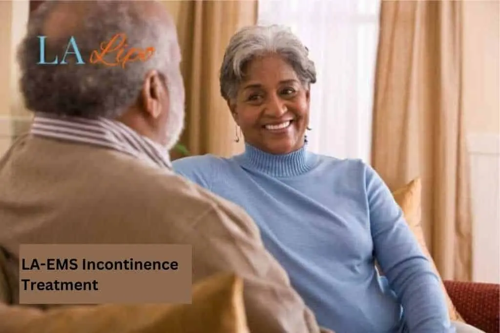 Couple sat smiling at each other - LA-EMS treatment Lower Morden