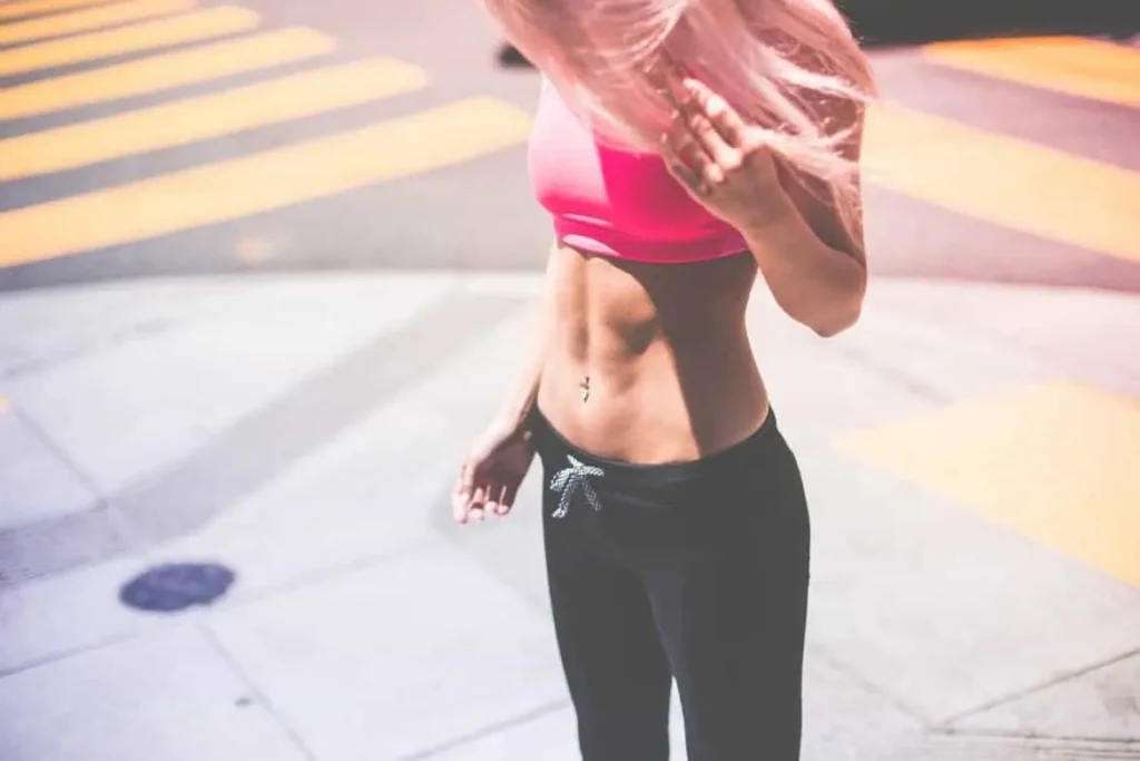 Woman with toned stomach after LA-EMS Body Sculpting Treatment Lower Morden